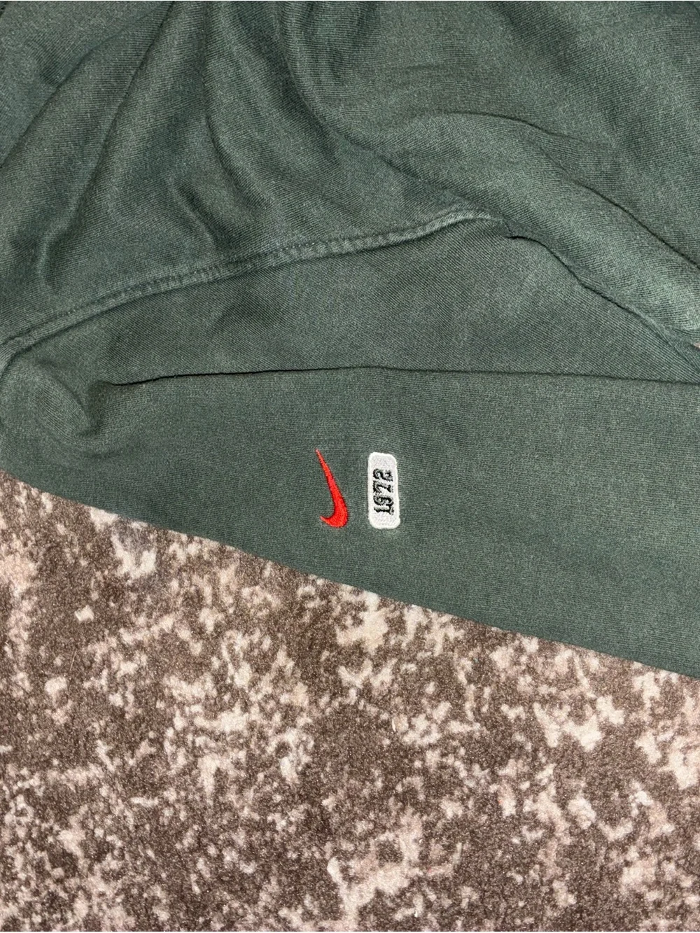 Nike Green Quarter-Zip Hoodie with Subtle Red Swoosh